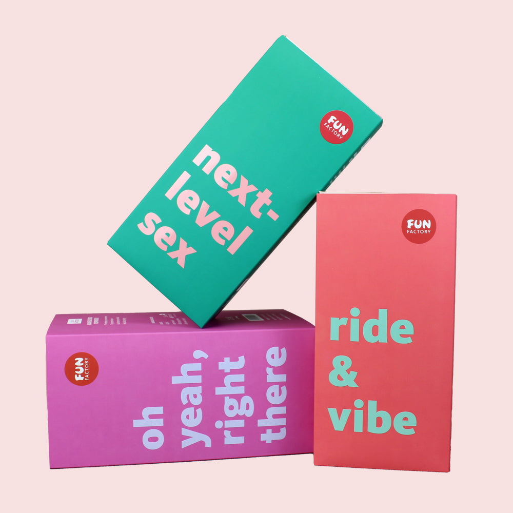 Three Fun Factory boxes with text about sex and vibes.