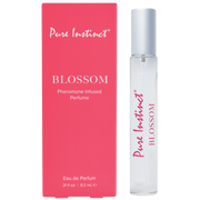 Pure Instinct Blossom Pheromone Infused Perfume in a clear spray bottle.