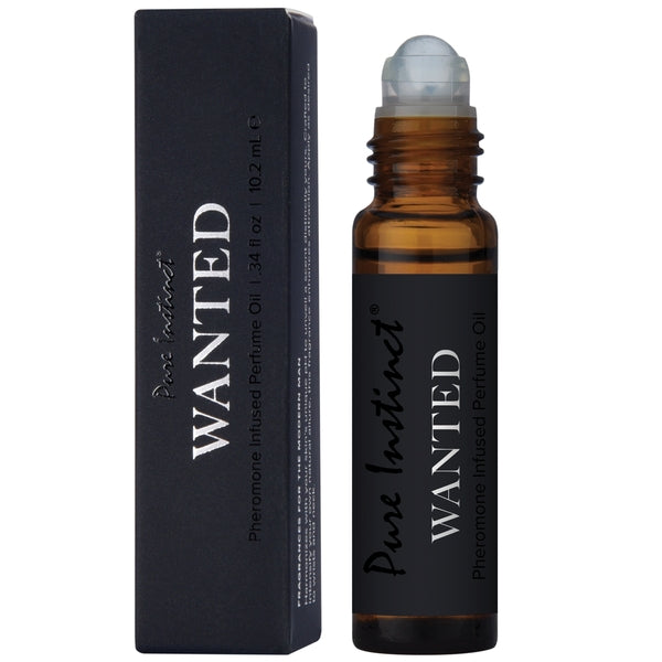 Pure Instinct Wanted Pheromone Perfume Oil for men in a rollerball bottle.