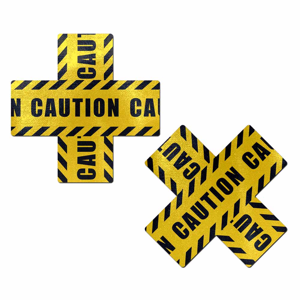Yellow caution tape nipple pasties in a cross and X shape.
