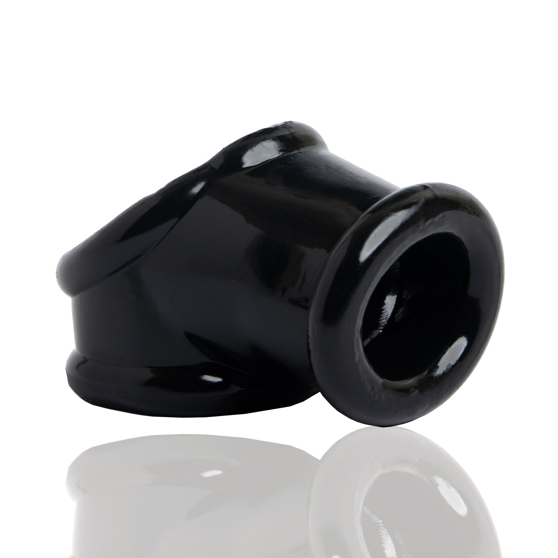 Black FLEXtpr cocksling and ball stretcher with a smooth, curved design.