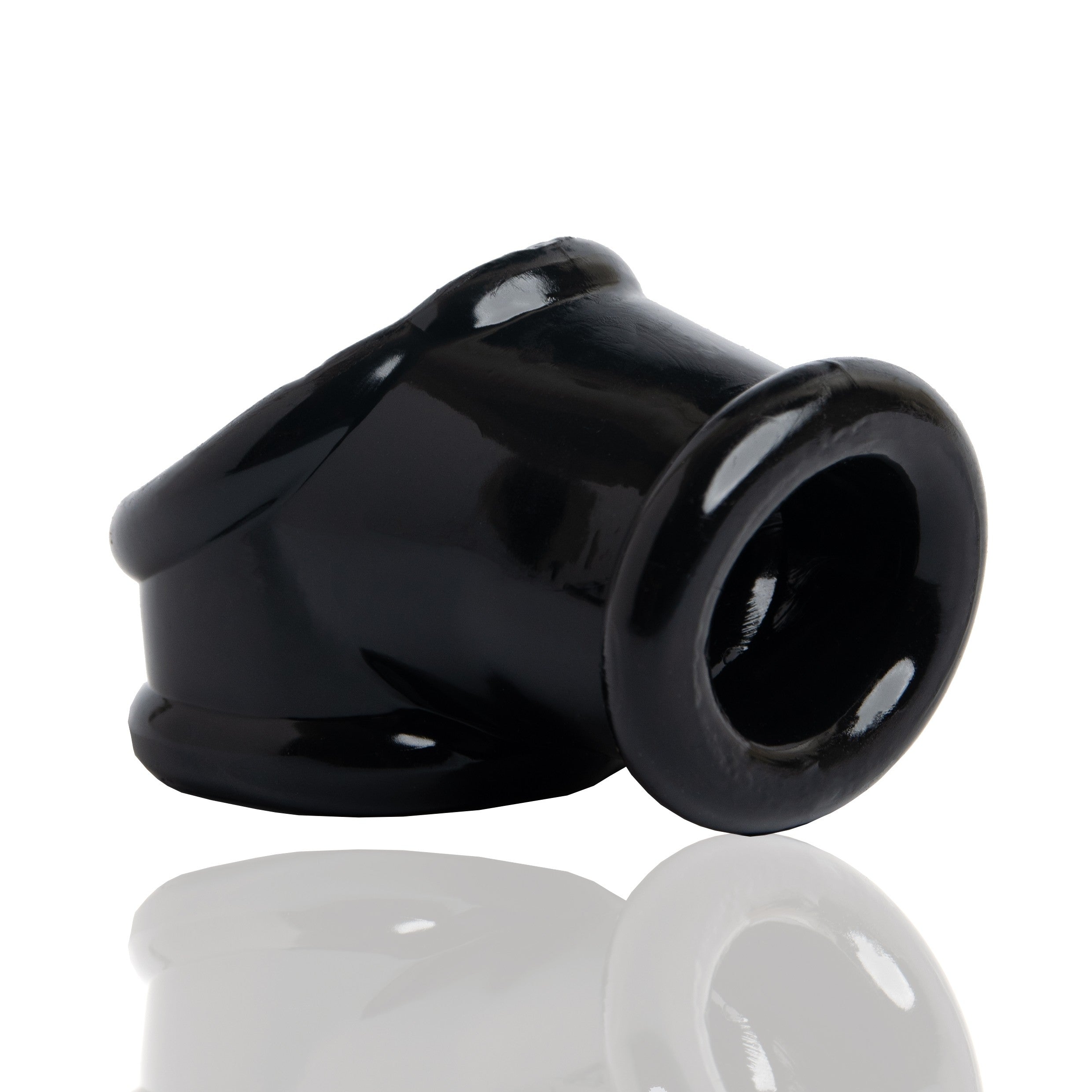 Black FLEXtpr cocksling and ball stretcher with a smooth, curved design.