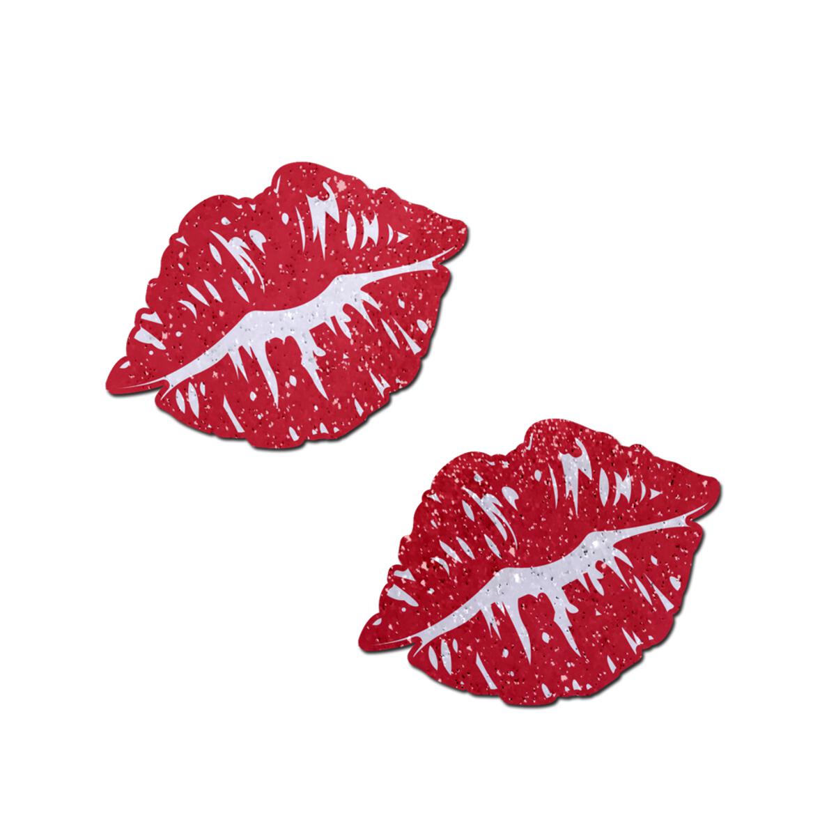 Two sparkly red kissing lips nipple pasties on a white background.