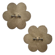 Light nude vegan suede nipple pasties with attached barbells.