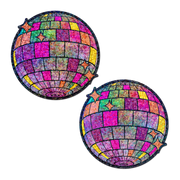 Two shimmering disco ball pasties with star accents on a black background.