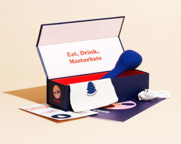 A blue vibrator is displayed in an open box with the text "Eat, Drink, Masturbate" inside.