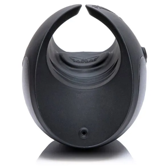 Black oscillating penis toy with a textured interior and a small circular opening at the bottom.