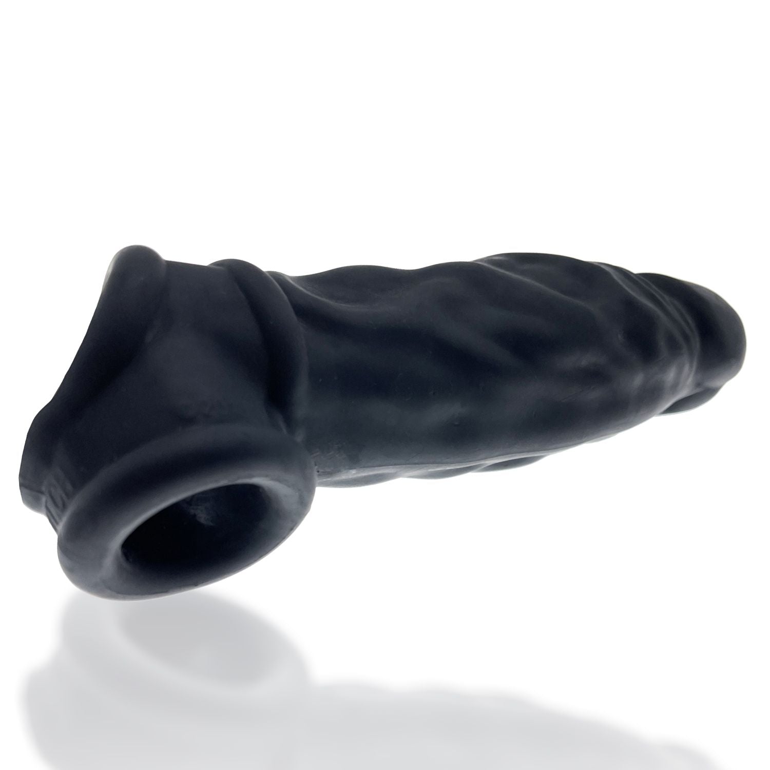 Black silicone cocksheath with a textured shaft and cock sling.