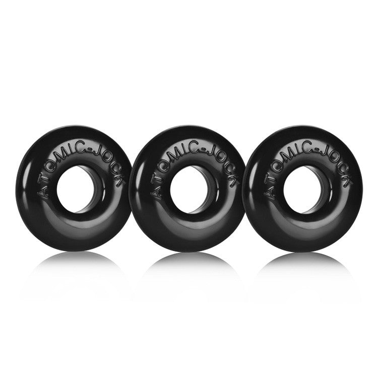 Three black stretchy cock rings with "ATOMIC JOCK" embossed.