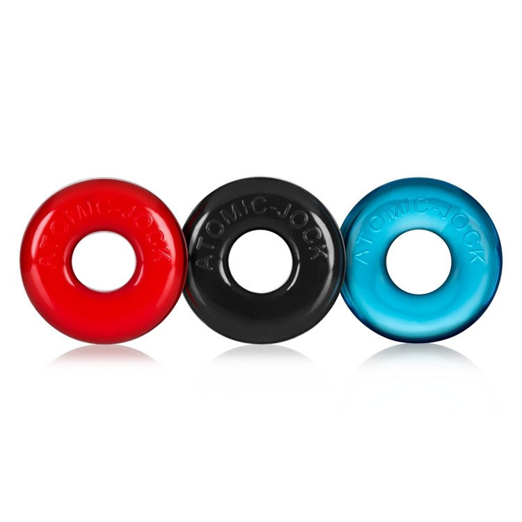 Three stretchy cock rings in red, black, and blue.
