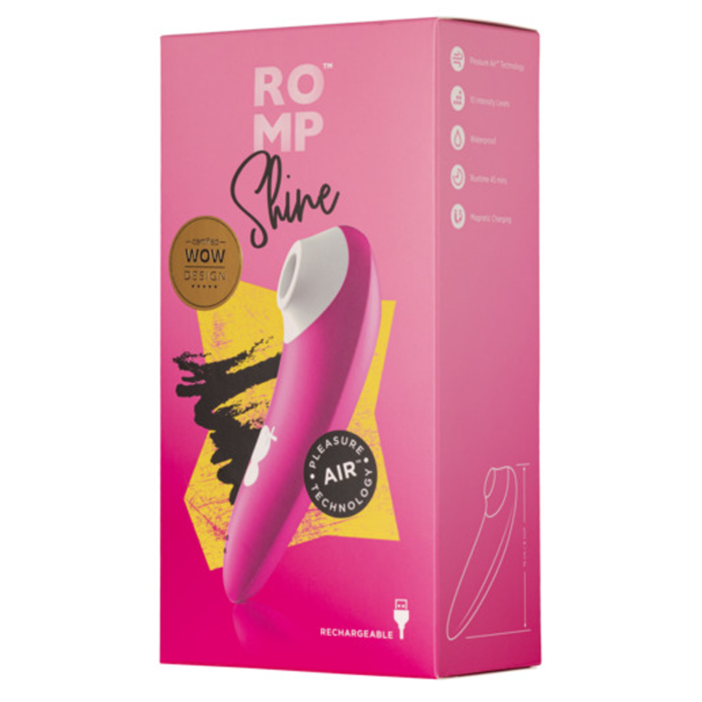 Pink clitoral suction vibrator with "ROMP Shine" branding and "Pleasure Air Technology" label.