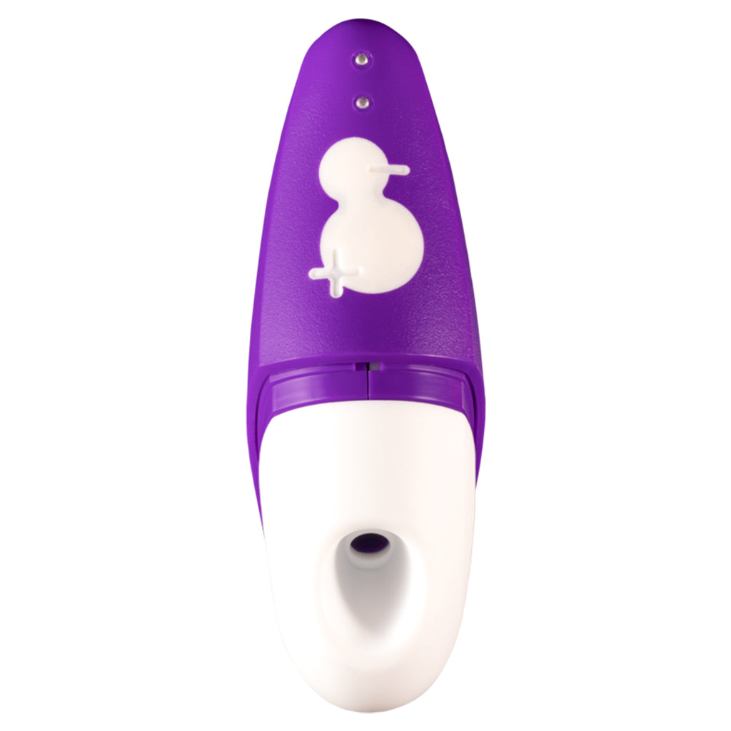 Purple and white clitoral suction vibrator with a penguin design.
