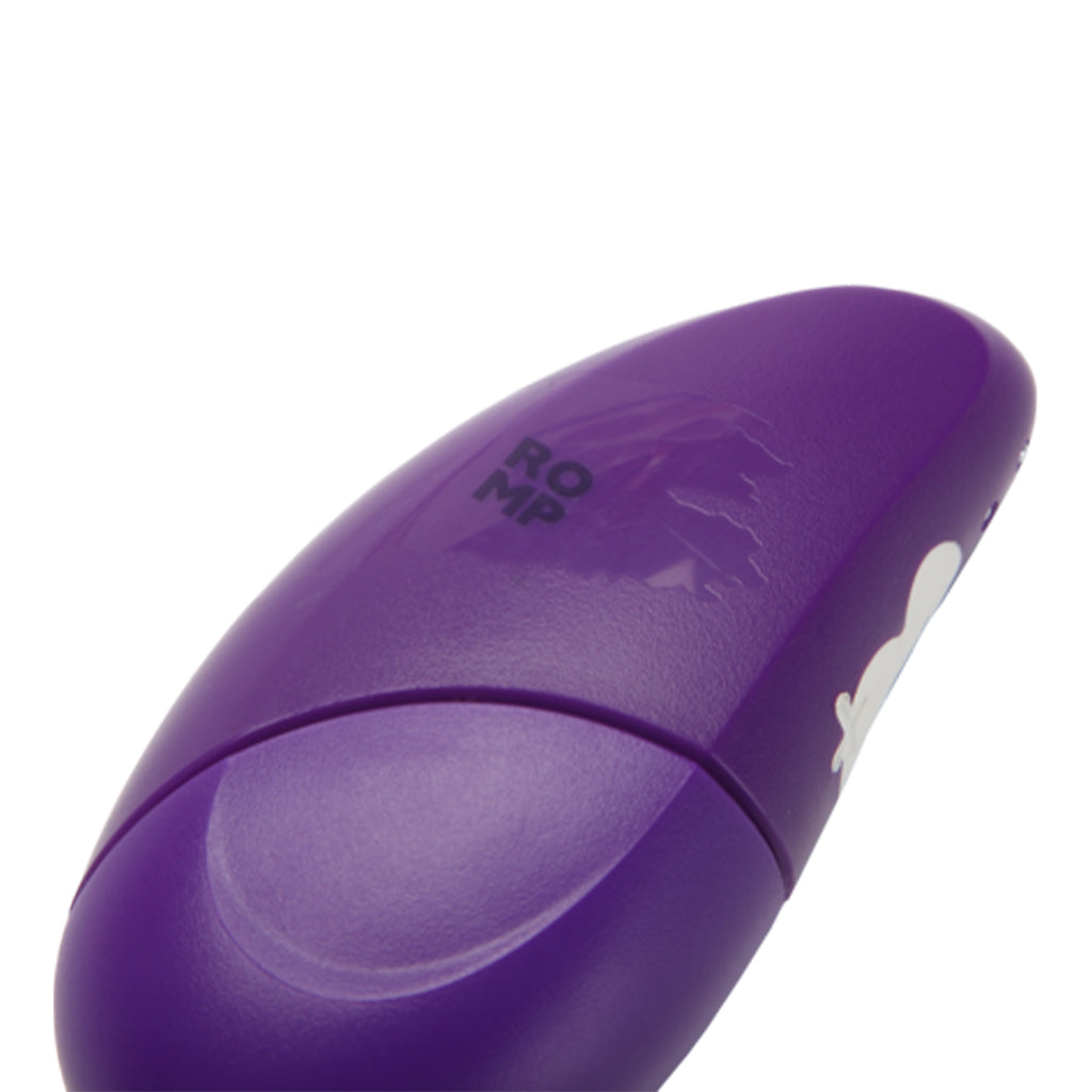 Purple clitoral suction vibrator with "ROMP" text.