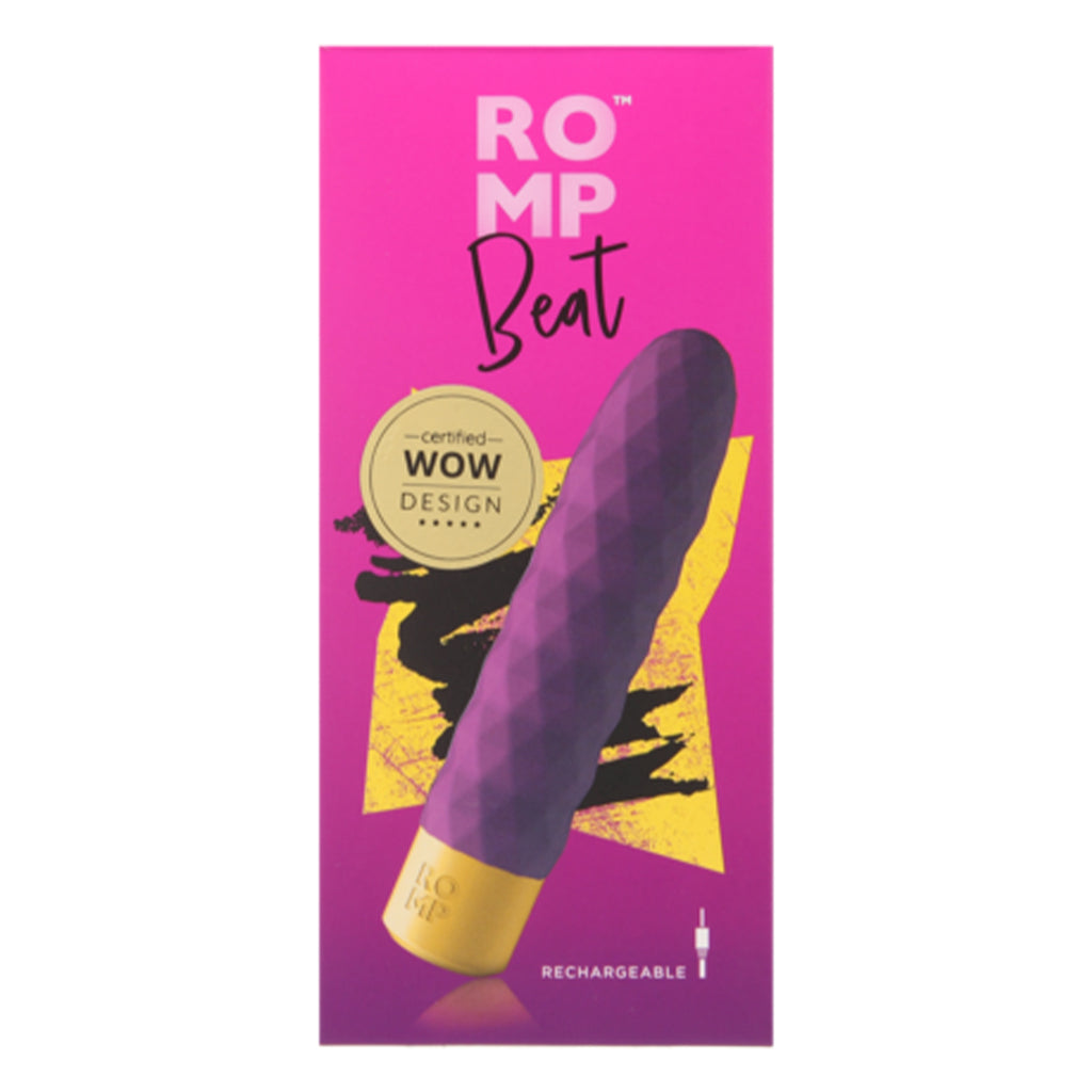 ROMP Beat rechargeable vibrator in purple with a gold base on a pink box.