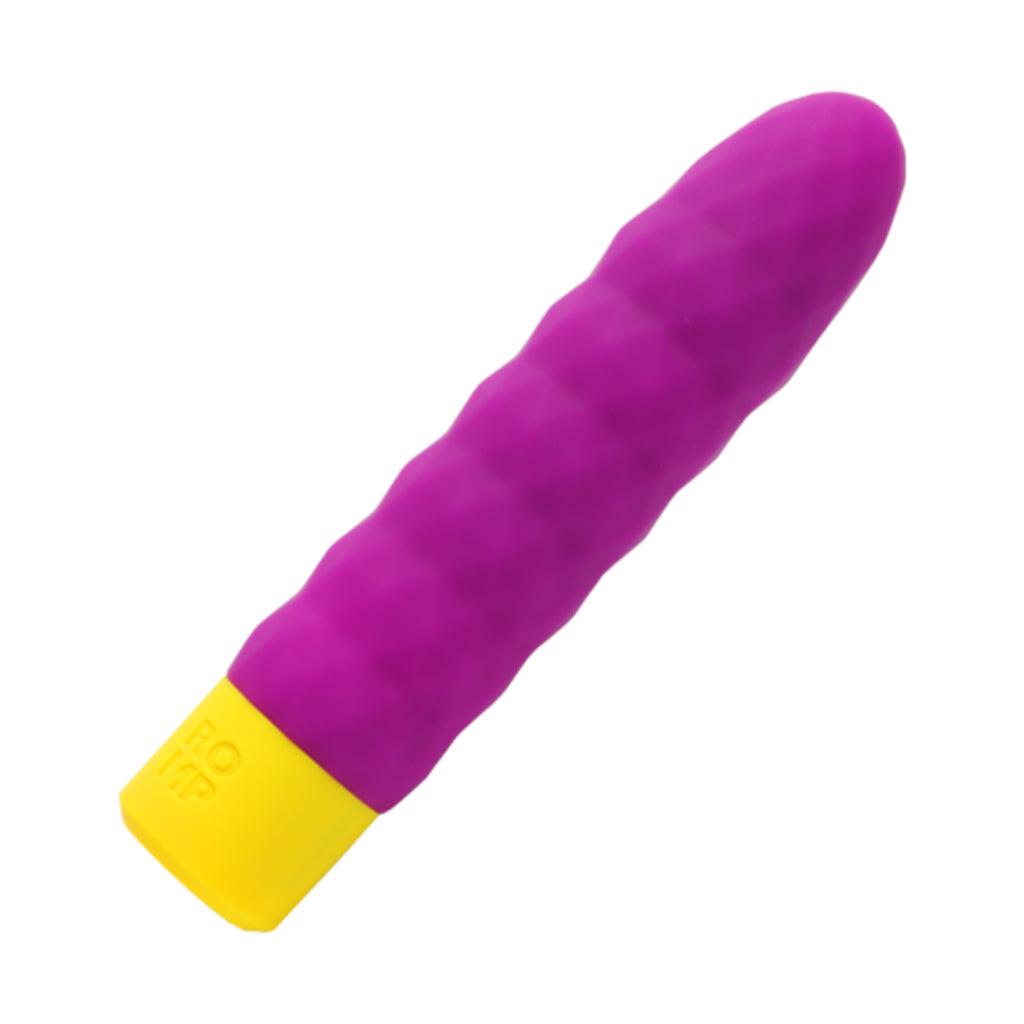 Purple and yellow bullet vibrator with ribbed texture.