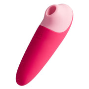 A pink and light pink clitoral stimulator with the word ROMP embossed on it.