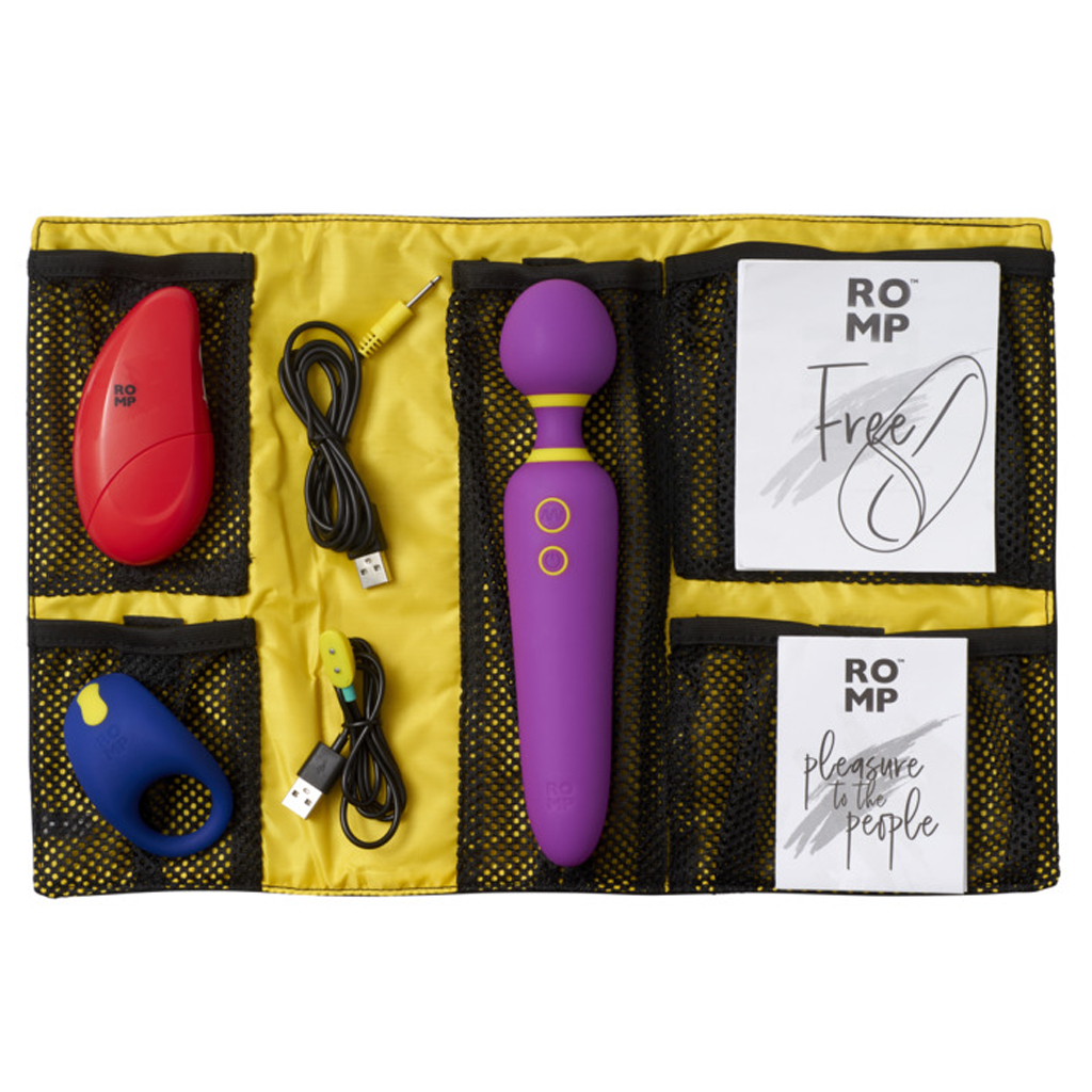 A ROMP Pleasure Kit with a purple wand, red stimulator, blue ring, and charging cables.