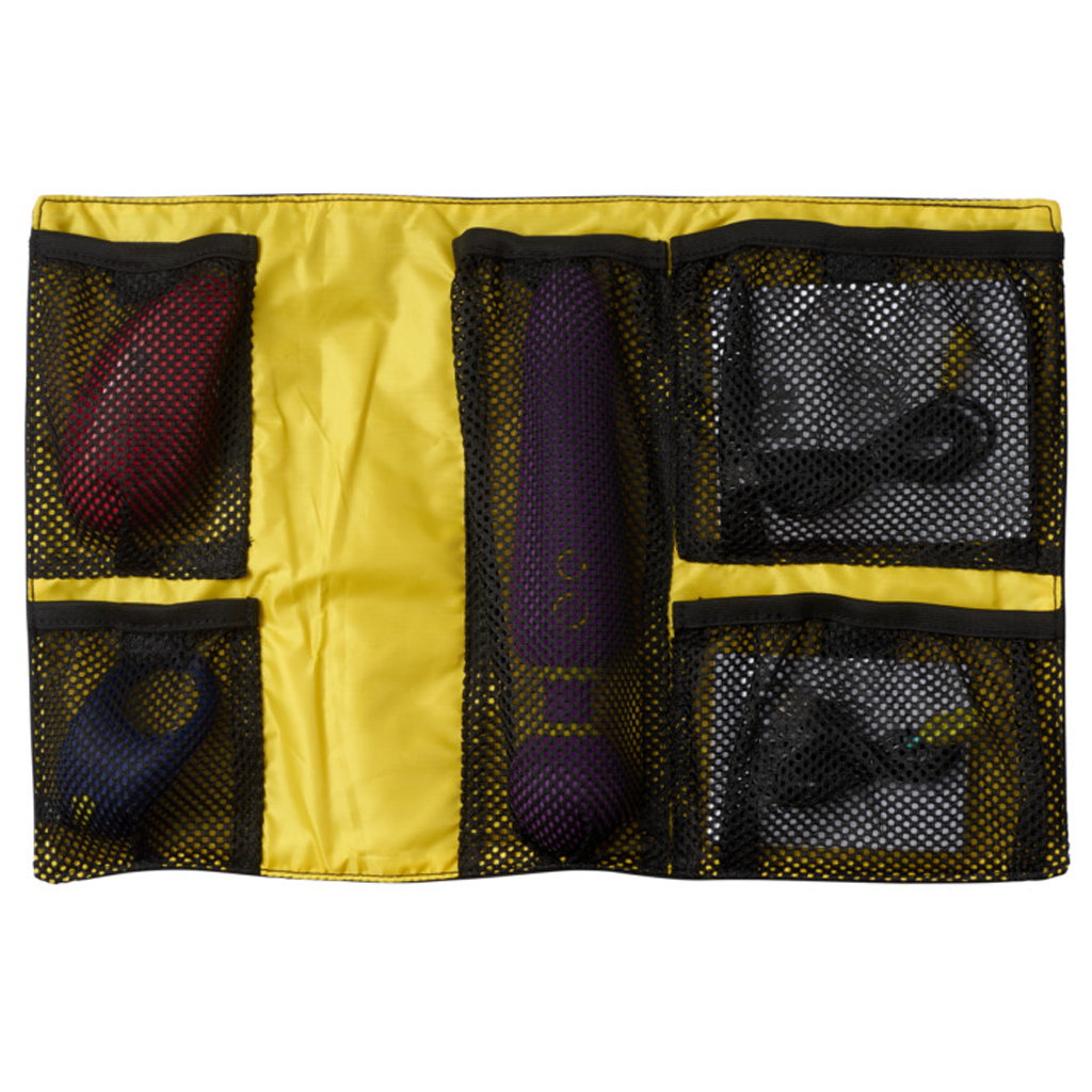 A yellow organizer with black mesh pockets holding a red, purple, and blue vibrator.