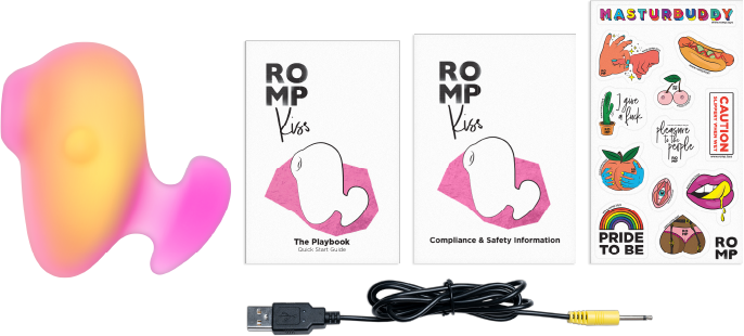 A pink and yellow clitoral suction stimulator with two instruction booklets and a sticker sheet.