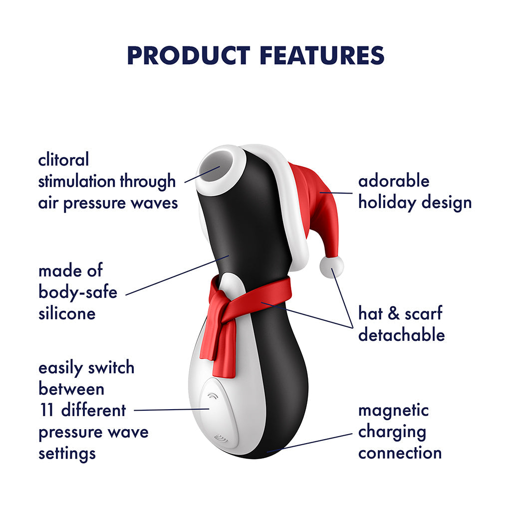 Penguin-shaped clitoral stimulator with holiday hat and scarf, made of silicone.