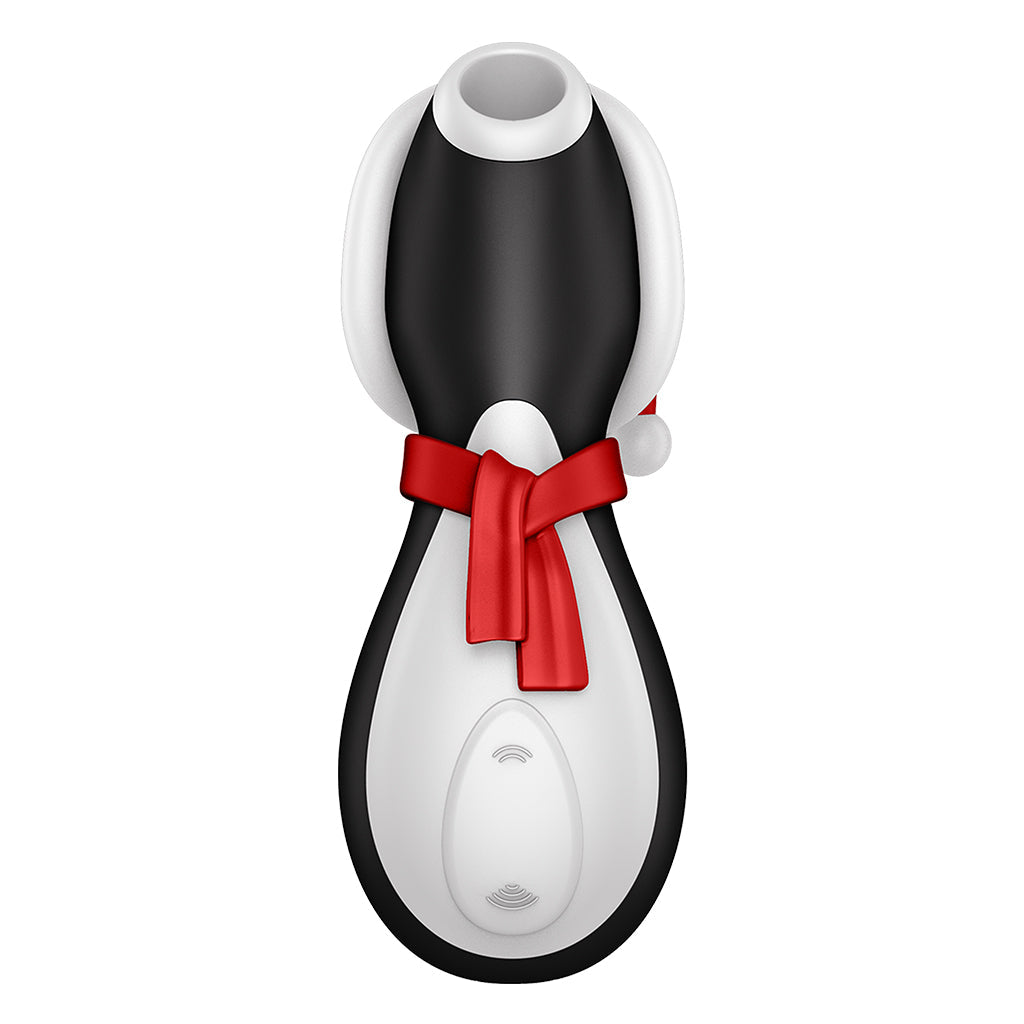 Penguin-shaped clitoral stimulator with a red scarf and white trim.
