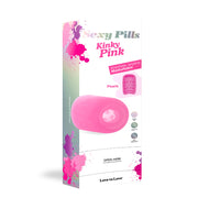 A pink pill-shaped male masturbator with textured interior.