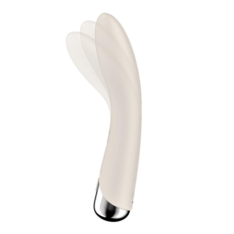 Curved beige vibrator with a rotating tip and three translucent motion lines.