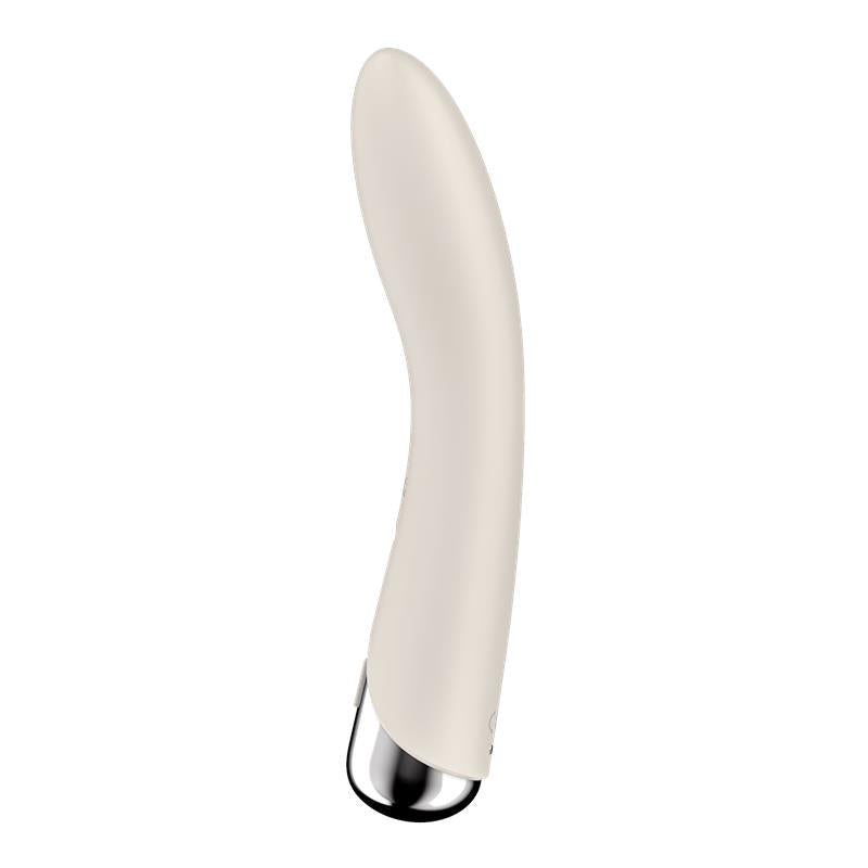 Curved white G-spot vibrator with a silver tip.