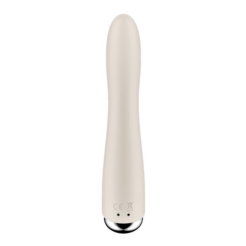 A beige rotating G-spot vibrator with a silver tip.