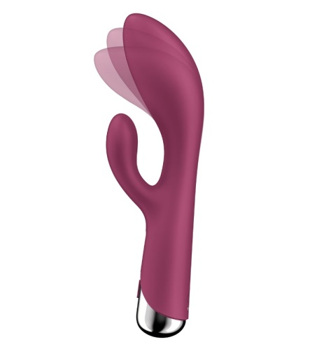 A pink rotating rabbit vibrator with a silver base.