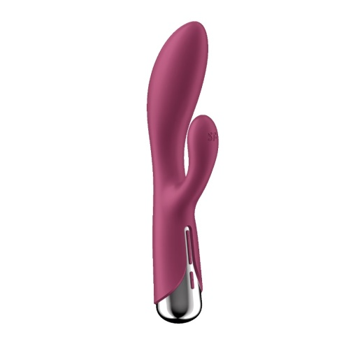 A pink rotating rabbit vibrator with a silver base.