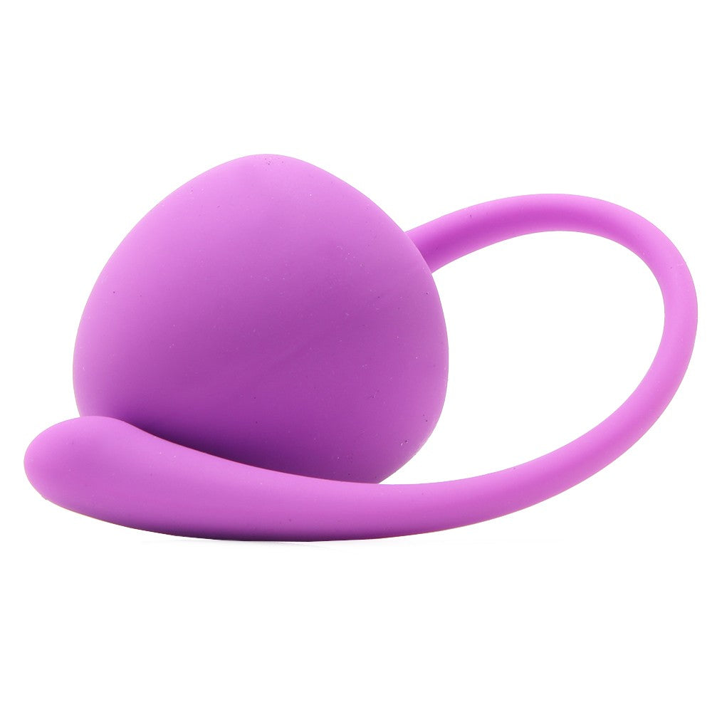 A purple kegel ball with a flexible loop.