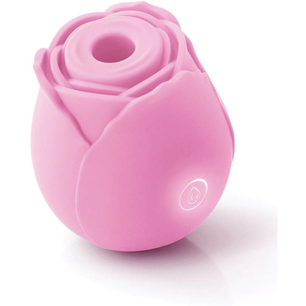 Pink rose-shaped massager with a textured opening and a glowing power button.