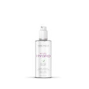 Wicked Simply Hybrid lubricant in a clear bottle with a white pump dispenser.