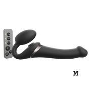 Black bendable remote control strap-on made of silicone.