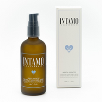 Intamo water-based lubricant in a brown glass bottle with a pump dispenser and a white box.