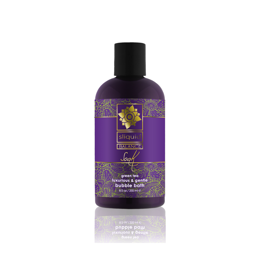 Purple bottle of Sliquid Green Tea Balance Body Soak with gold floral accents.