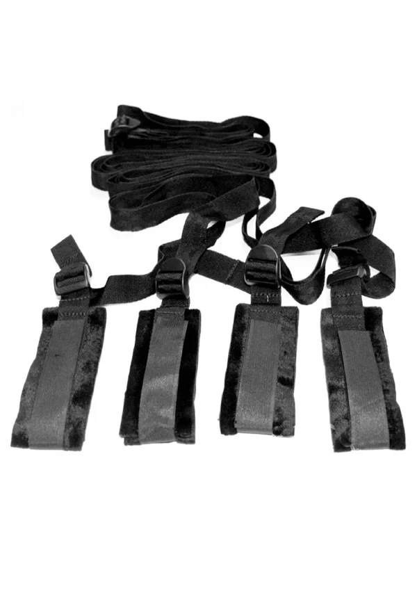 Black bondage restraint kit with four adjustable straps and cuffs.