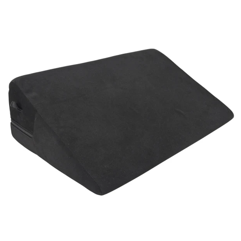 Black wedge pillow with restraint loops.