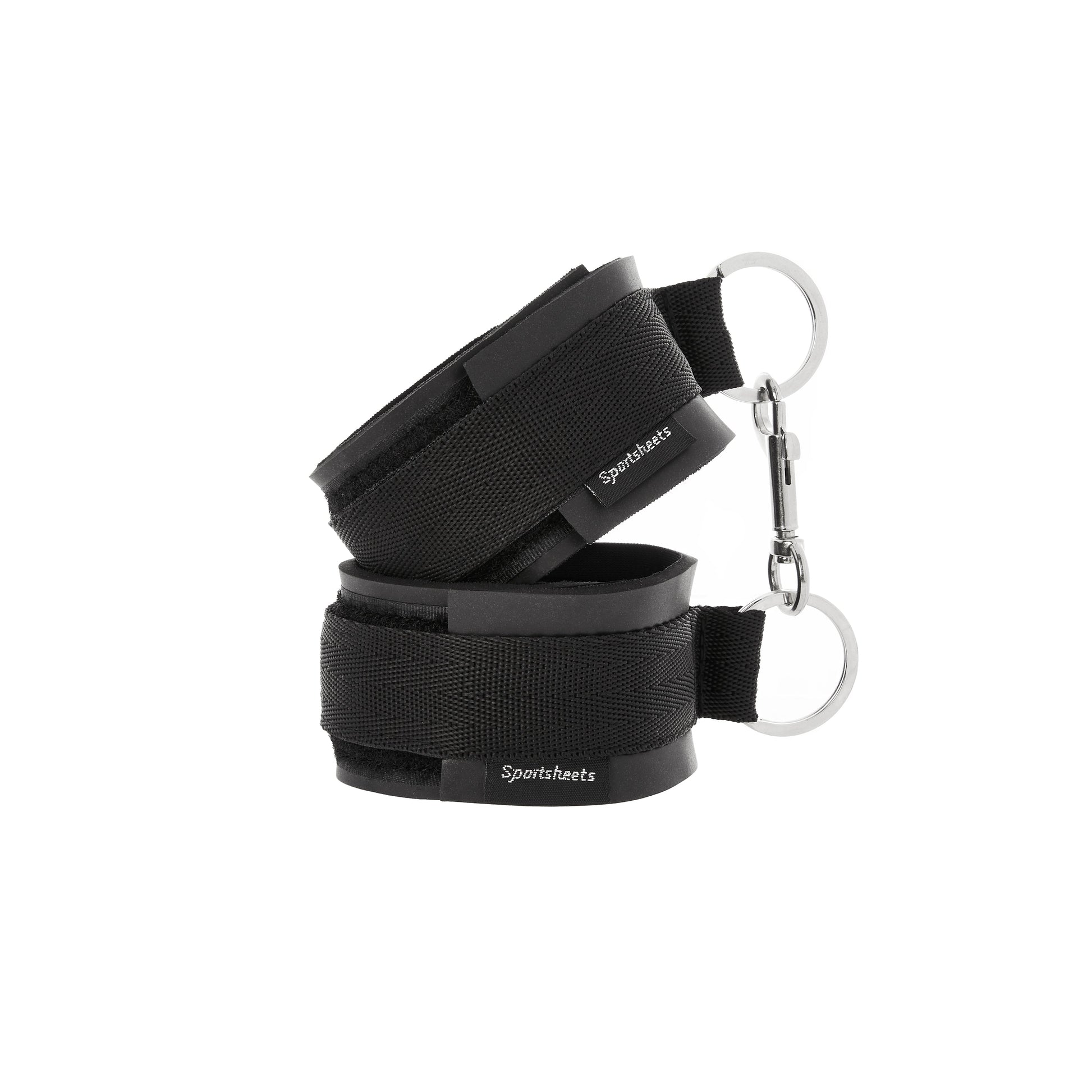Black adjustable neoprene bondage cuffs with metal rings and carabiner.