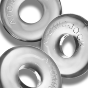 Three clear, stretchy cock rings with "ATOMIC-JOCK" embossed on them.