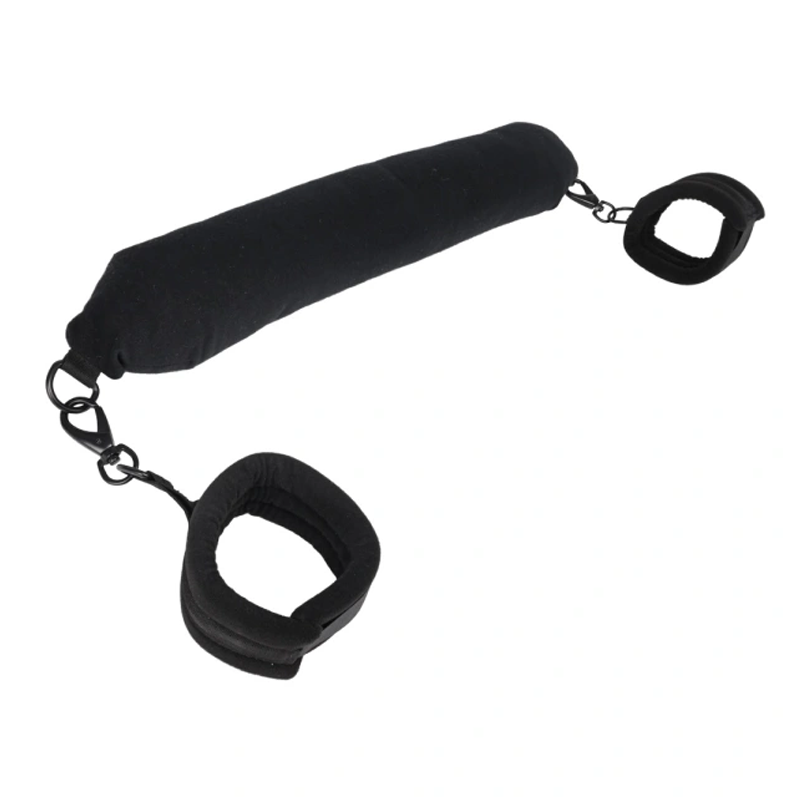 Black padded positioning bar with two restraint cuffs.
