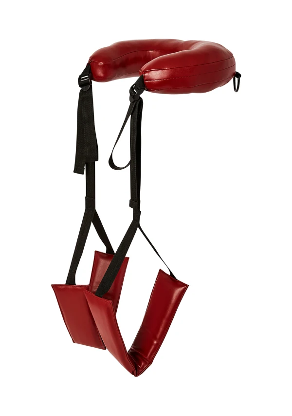 Red padded thigh sling with black straps.