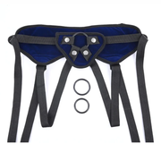 Blue velvet strap-on harness with black straps and metal rings.