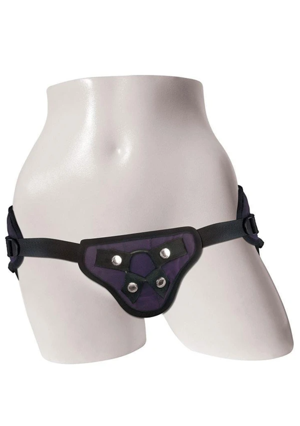 Purple adjustable strap-on harness with a bullet pocket on a mannequin.
