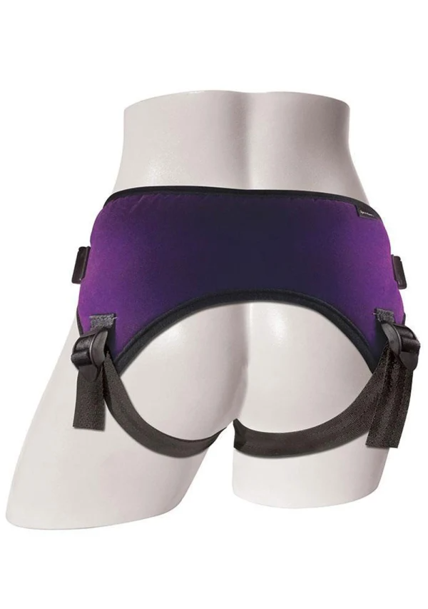 Purple adjustable strap-on harness with black straps and buckles.