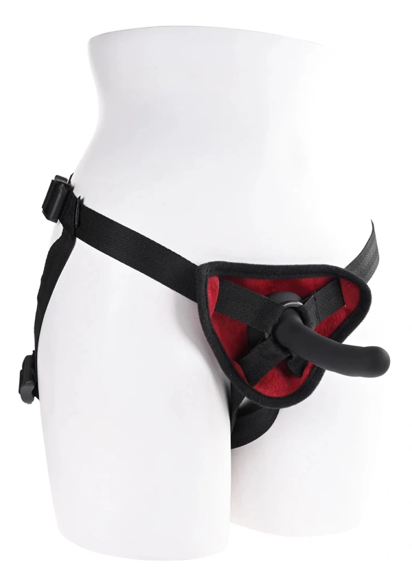 Silicone pegging kit with adjustable harness and black dildo.