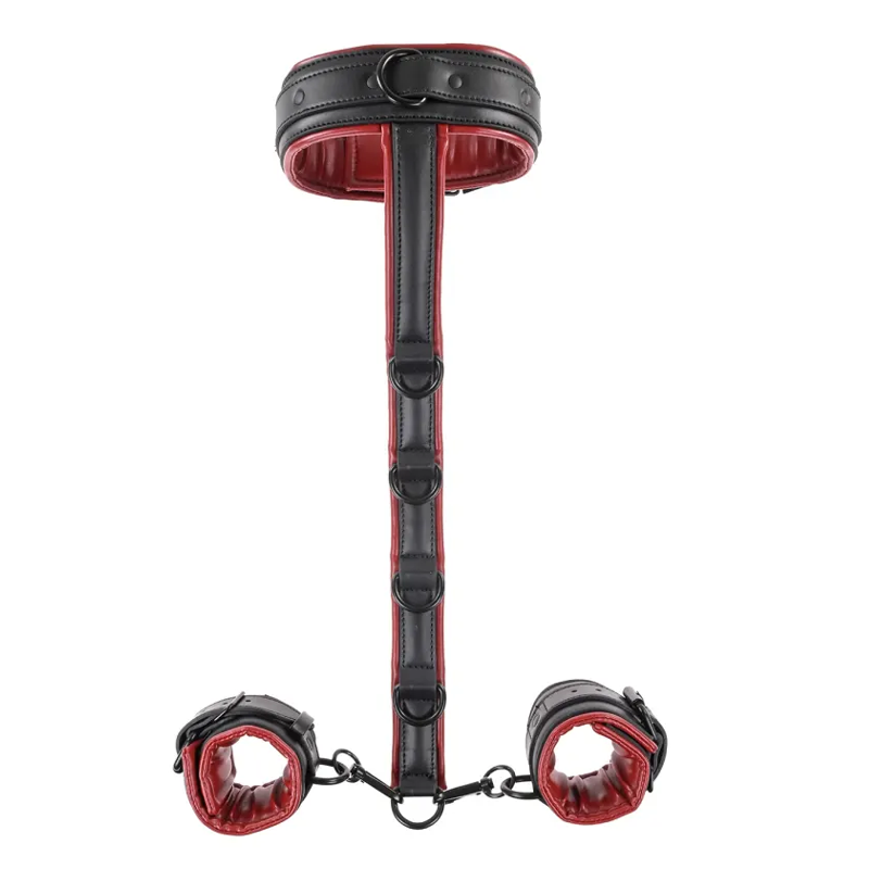 Black and red faux leather neck and wrist restraint with metal D-rings.