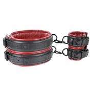 Black and red faux leather thigh and wrist cuff set with metal hardware.