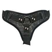 Black lace harness with adjustable straps and an O-ring.